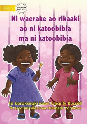 Up and Down and Round and Round - Ni waerake ao rikaaki ao ni katoobibia ma ni katoobibia (Te Kiribati) by Russell, Charity